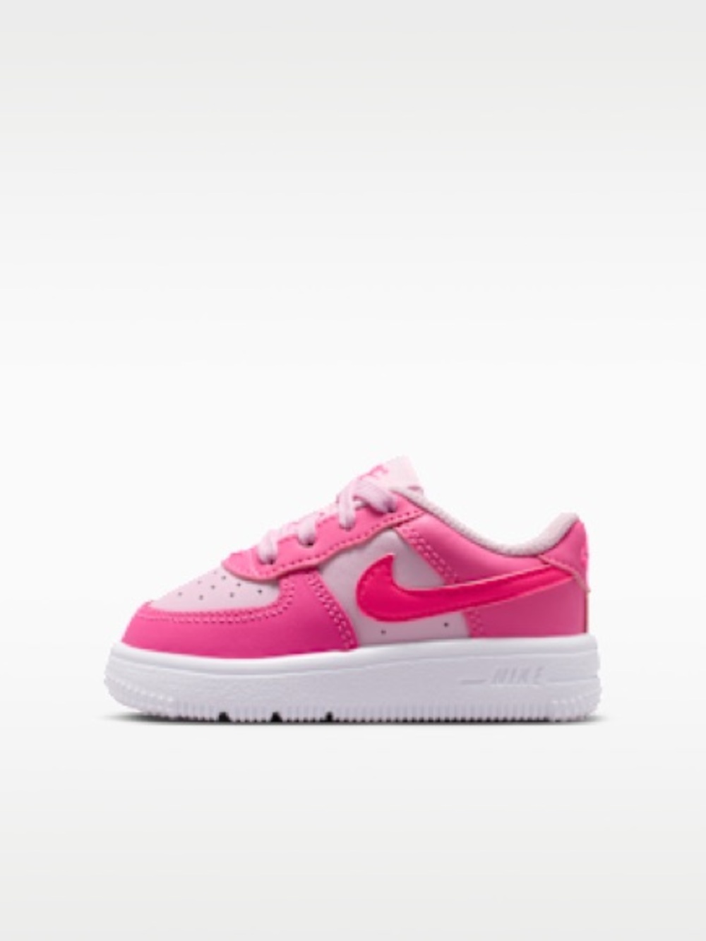 Nike Kids Pink Low-Top Sneakers with Bright Swoosh
